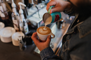 man making a coffee